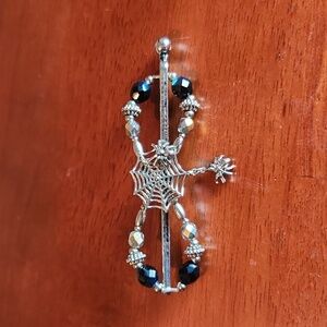 Halloween flexi hair clip. Spider accent. Silver clip with black gems. Medium